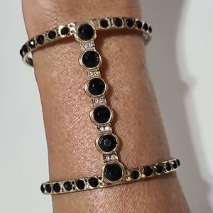 None Gold Tone bracelet Black Stones
